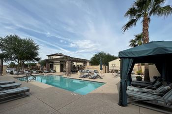 Community pool with cabanas